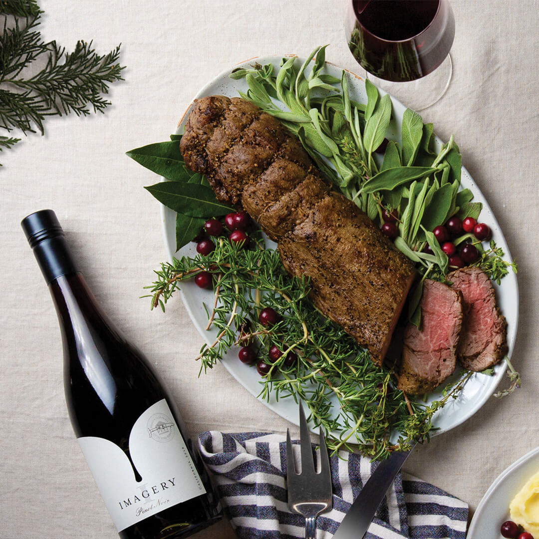 Beef Tenderloin Plate With A Bottle Of Wine