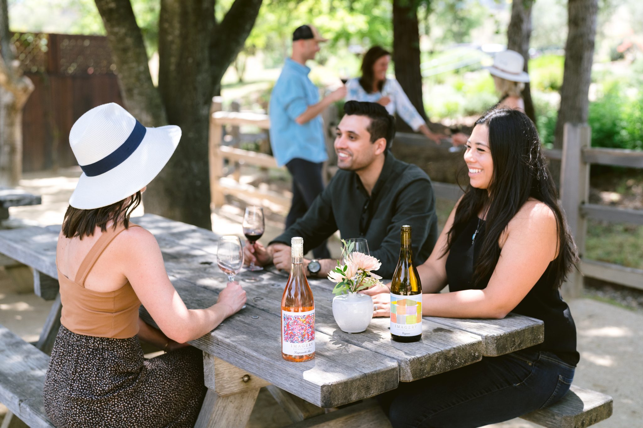 Group Dining At A Picnic Table